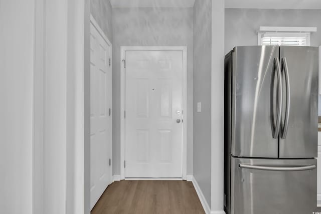 901 W Port Dr Unit 1706, North Myrtle Beach, SC 29582 - kitchen with freestanding refrigerator, baseboards, and wood finished floors