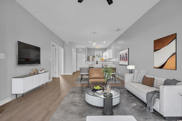 901 W Port Dr Unit 1706, North Myrtle Beach, SC 29582 - living room with visible vents, recessed lighting, a ceiling fan, baseboards, and light wood-style floors