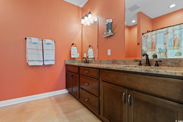 bathroom with tile patterned floors, vanity, and a shower with shower curtain