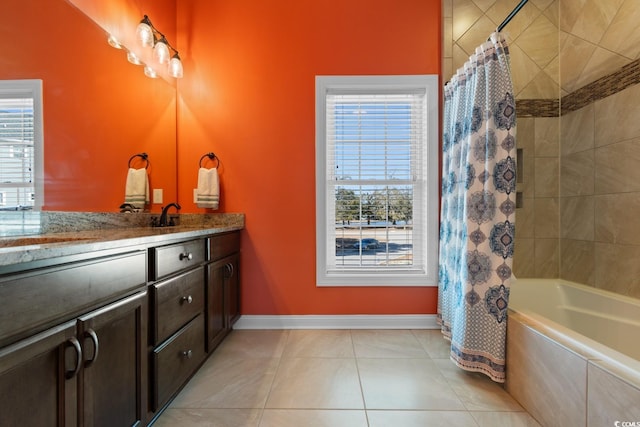 bathroom with vanity, shower / tub combo with curtain, and tile patterned floors