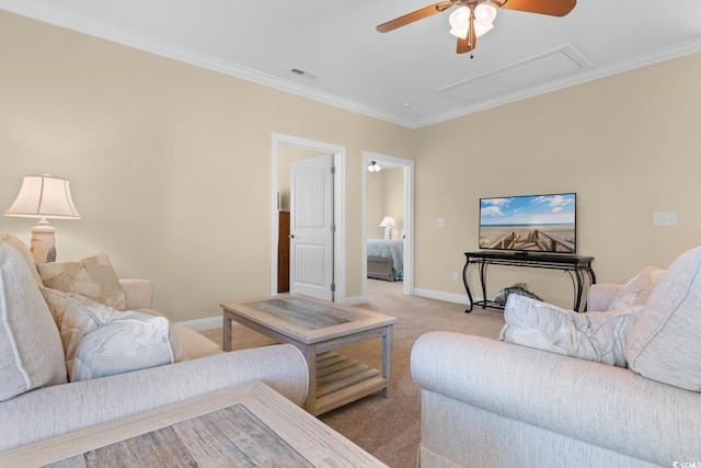 carpeted living room featuring crown molding and ceiling fan