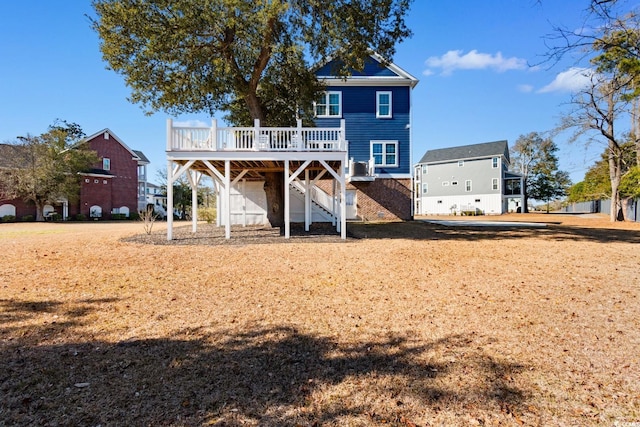 rear view of property with a deck