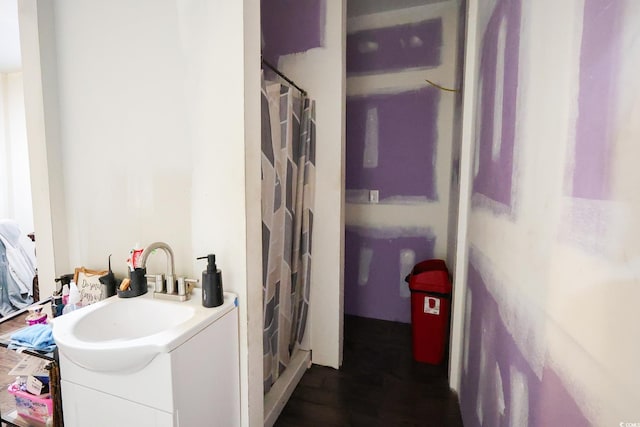 bathroom with vanity and a shower with curtain