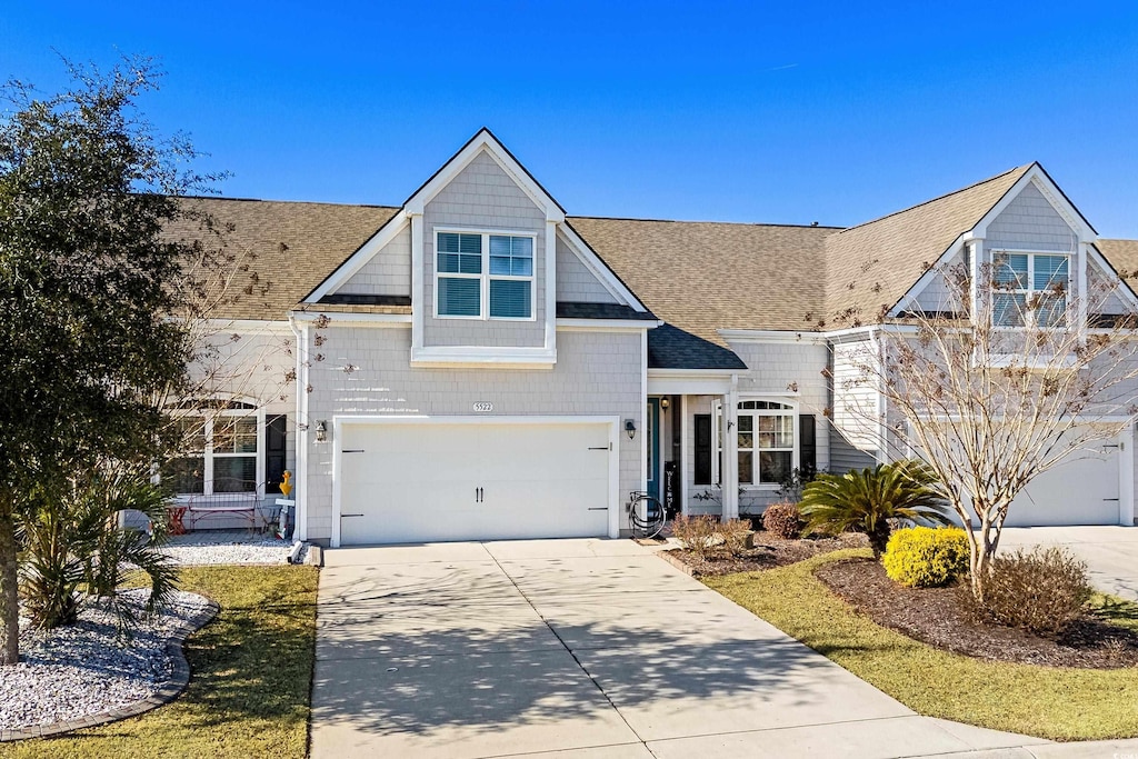 craftsman-style home featuring a garage