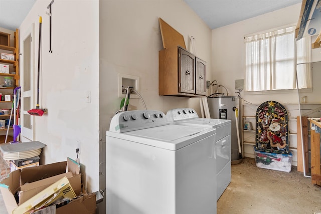 1020 Thomas Ave, North Myrtle Beach, SC 29582 - washroom featuring water heater, washing machine and dryer, and cabinet space
