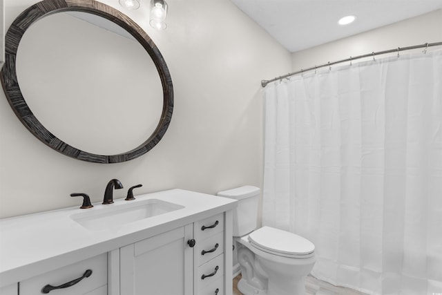 1020 Thomas Ave, North Myrtle Beach, SC 29582 - bathroom with toilet, vanity, recessed lighting, and curtained shower