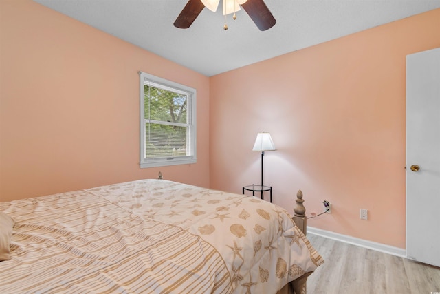1020 Thomas Ave, North Myrtle Beach, SC 29582 - bedroom featuring wood finished floors, baseboards, and ceiling fan