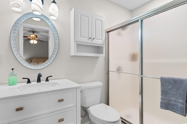 1020 Thomas Ave, North Myrtle Beach, SC 29582 - full bathroom featuring a ceiling fan, a shower stall, toilet, and vanity