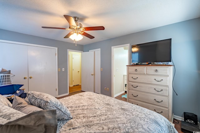 bedroom featuring hardwood / wood-style floors and ceiling fan