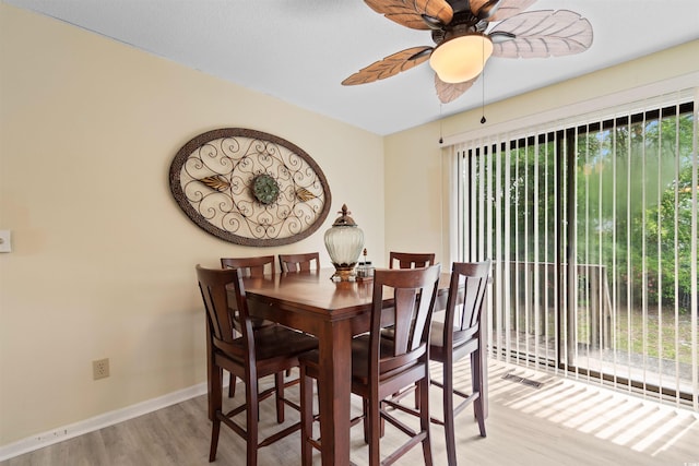 1020 Thomas Ave, North Myrtle Beach, SC 29582 - dining room featuring wood finished floors, baseboards, and a ceiling fan