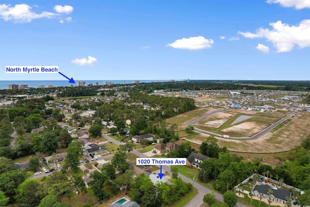1020 Thomas Ave, North Myrtle Beach, SC 29582 - aerial view of property and surrounding area featuring nearby suburban area and a nearby body of water