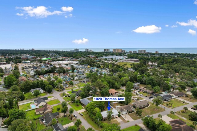 1020 Thomas Ave, North Myrtle Beach, SC 29582 - aerial view of property's location featuring nearby urban area and a large body of water