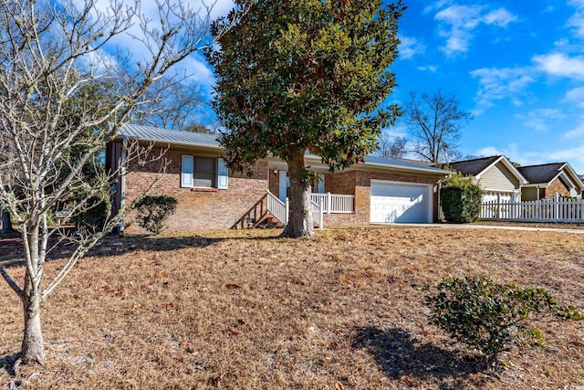 single story home featuring a garage