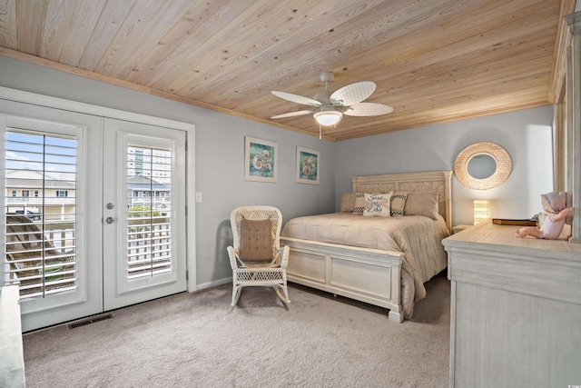 bedroom featuring ceiling fan, french doors, access to outside, light colored carpet, and wood ceiling