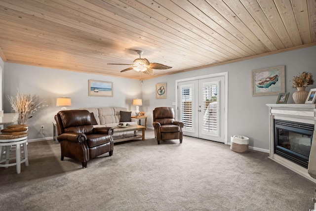 living room with carpet floors, french doors, and wood ceiling