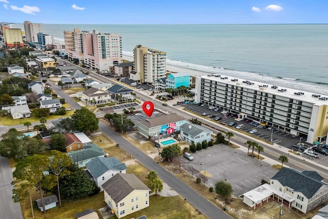 aerial view with a beach view and a water view