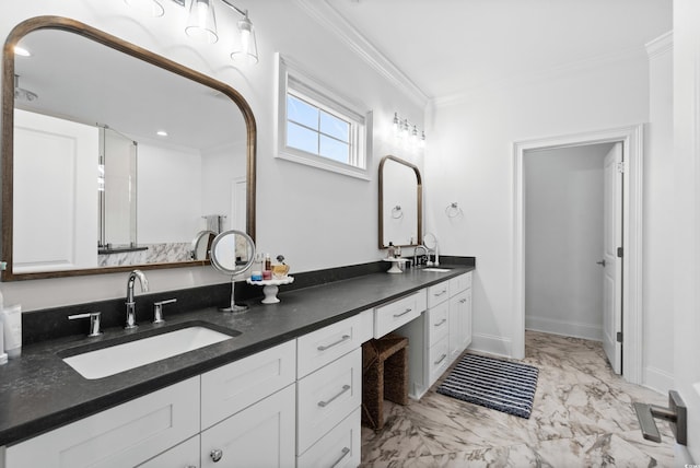 bathroom featuring ornamental molding and vanity