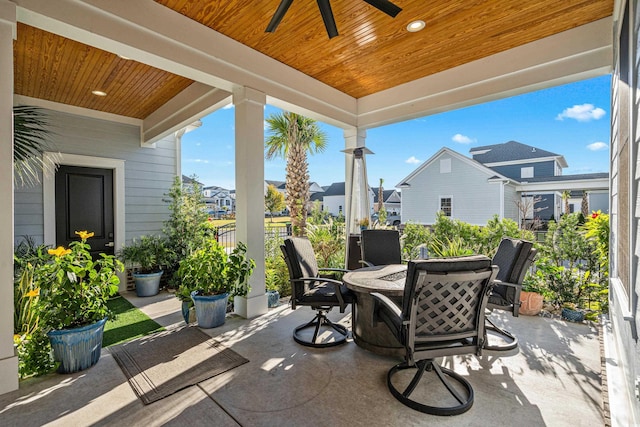 view of patio featuring ceiling fan