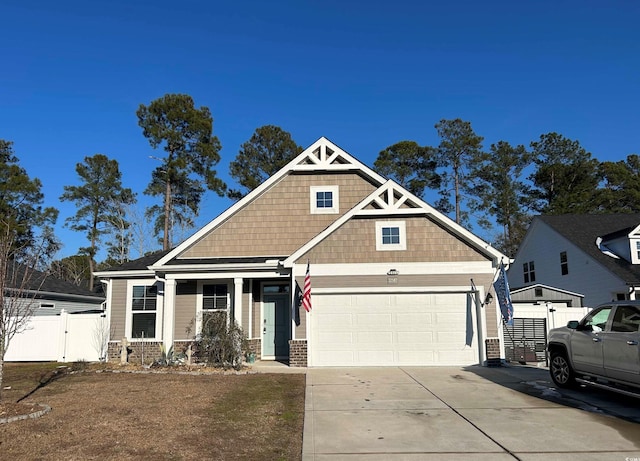 craftsman house with a garage