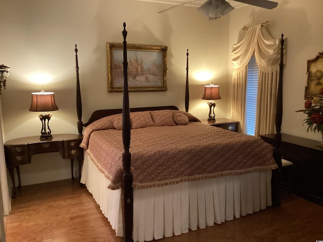 bedroom featuring hardwood / wood-style flooring and ceiling fan