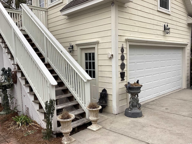 view of exterior entry featuring a garage