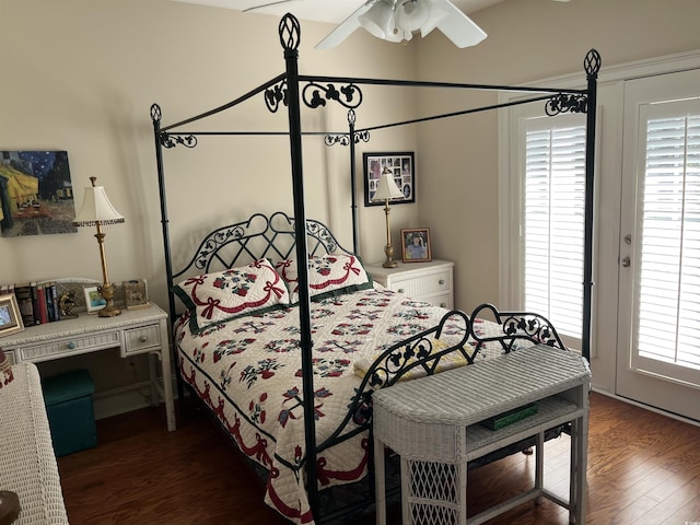 bedroom featuring dark hardwood / wood-style flooring and ceiling fan