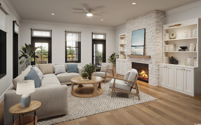 living room featuring crown molding, a fireplace, built in features, and light wood-type flooring