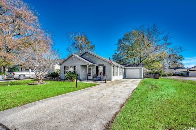 ranch-style home with a garage and a front yard