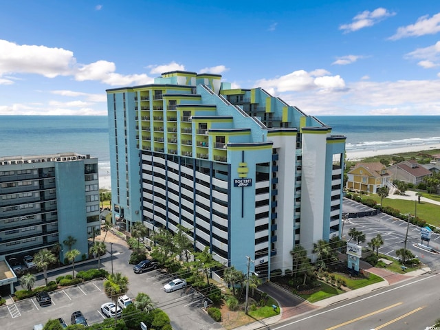 view of building exterior with a water view