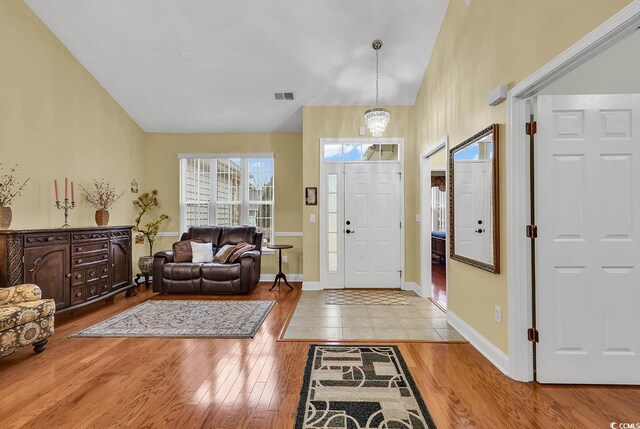 entrance foyer featuring light hardwood / wood-style floors