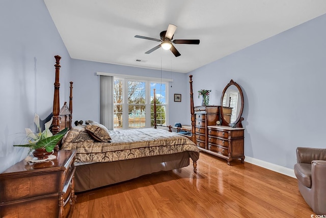 bedroom featuring ceiling fan and light hardwood / wood-style floors