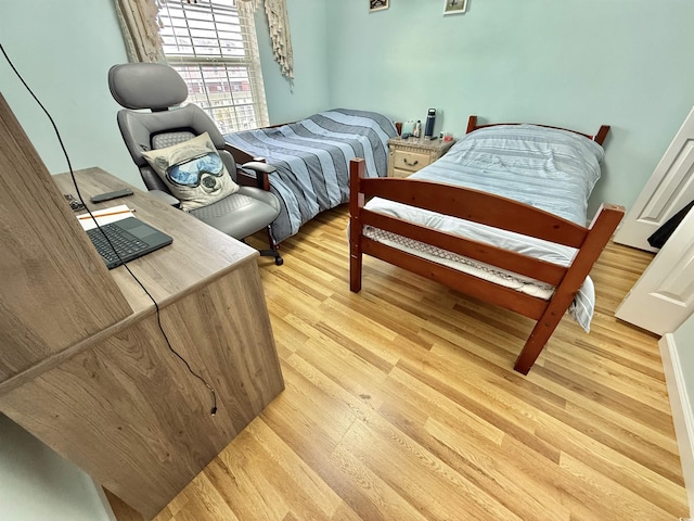 bedroom featuring light hardwood / wood-style floors