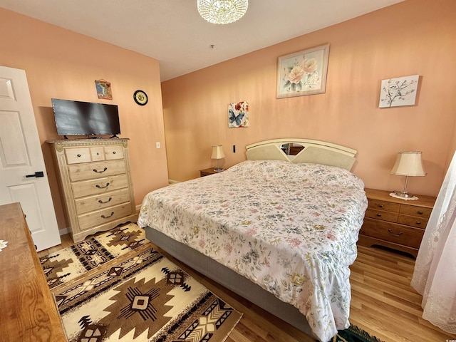 bedroom featuring light wood-type flooring