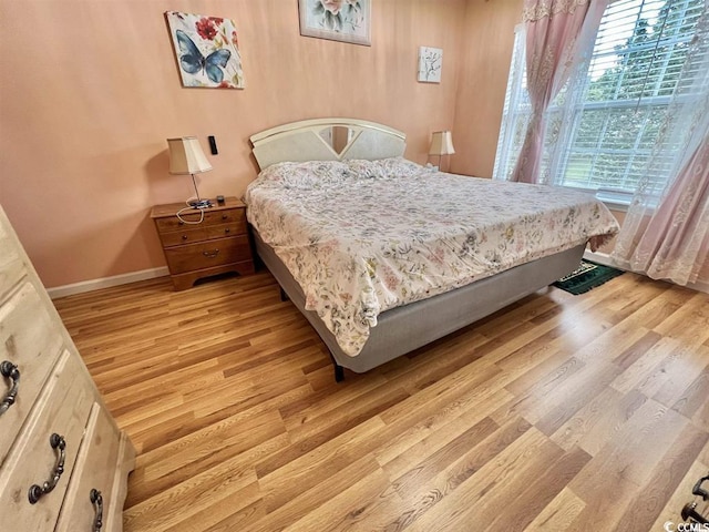 bedroom featuring light wood-type flooring