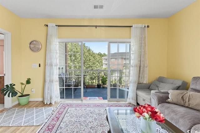 doorway to outside featuring hardwood / wood-style flooring