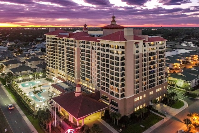 view of property at dusk