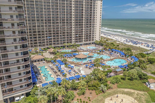 aerial view featuring a water view and a view of the beach