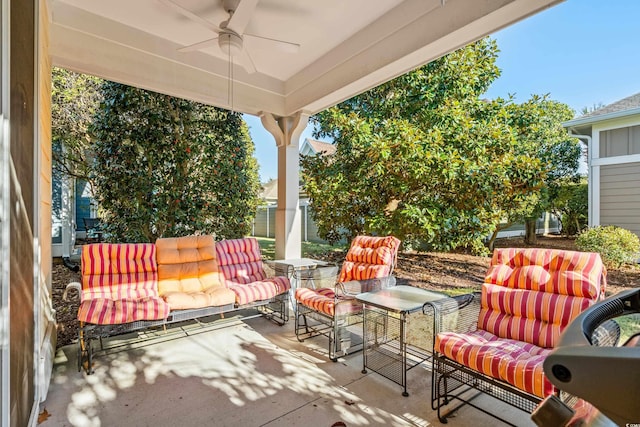 view of patio with outdoor lounge area and ceiling fan