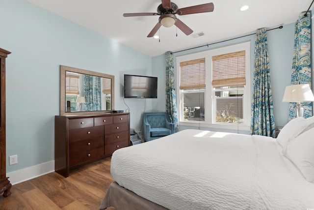 bedroom featuring ceiling fan and light wood-type flooring