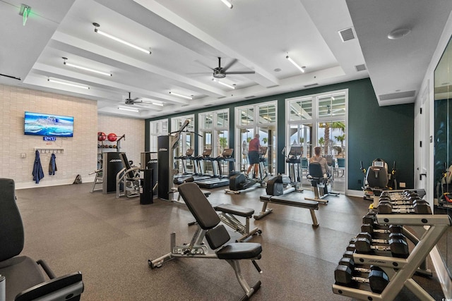 1410 Saw Palmetto St, North Myrtle Beach, SC 29582 - exercise room with a ceiling fan and beamed ceiling