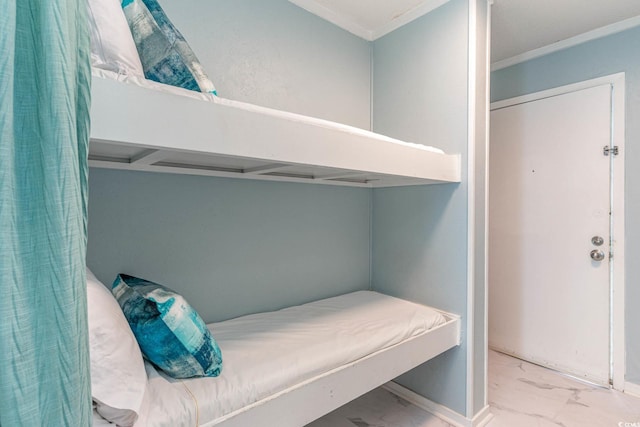 bedroom with ornamental molding