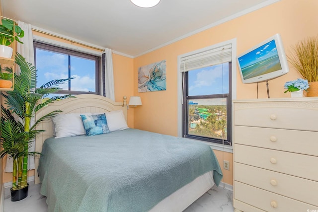 bedroom with ornamental molding