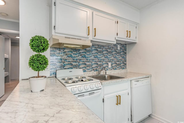 kitchen featuring crown molding, sink, white appliances, and tasteful backsplash