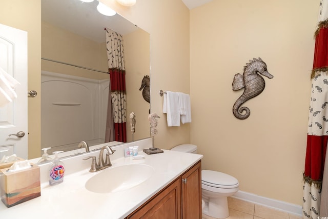 bathroom featuring tile patterned flooring, vanity, curtained shower, and toilet