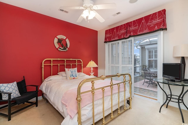 carpeted bedroom with access to outside and ceiling fan