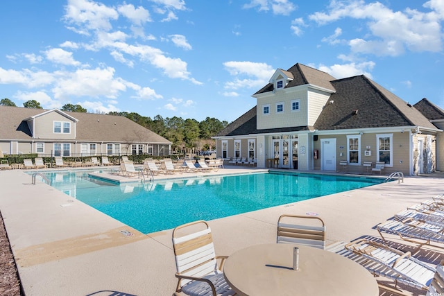 view of swimming pool featuring a patio