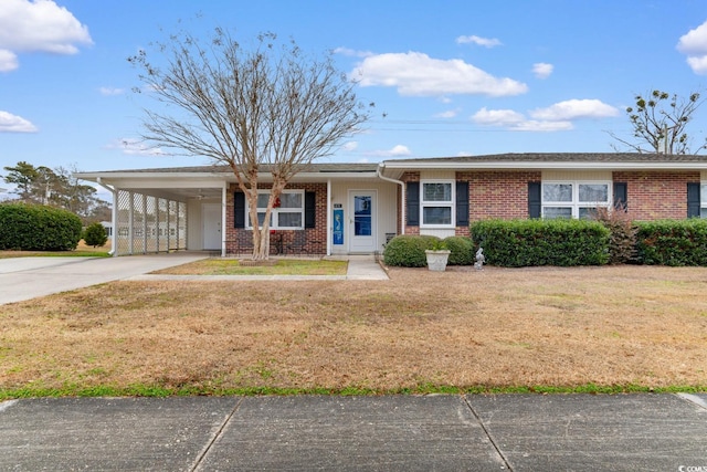 single story home with a carport and a front lawn