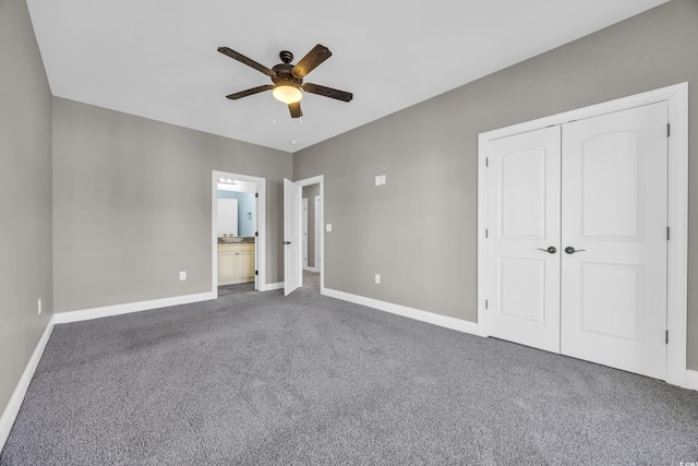 unfurnished bedroom featuring connected bathroom, a closet, ceiling fan, and carpet flooring