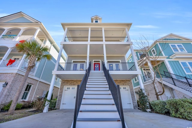 view of front of house with a balcony and a garage