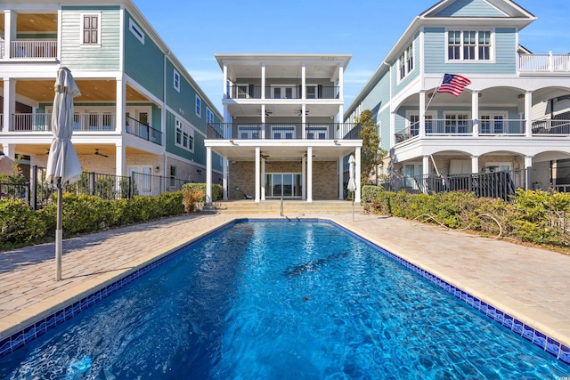 rear view of property featuring a patio area